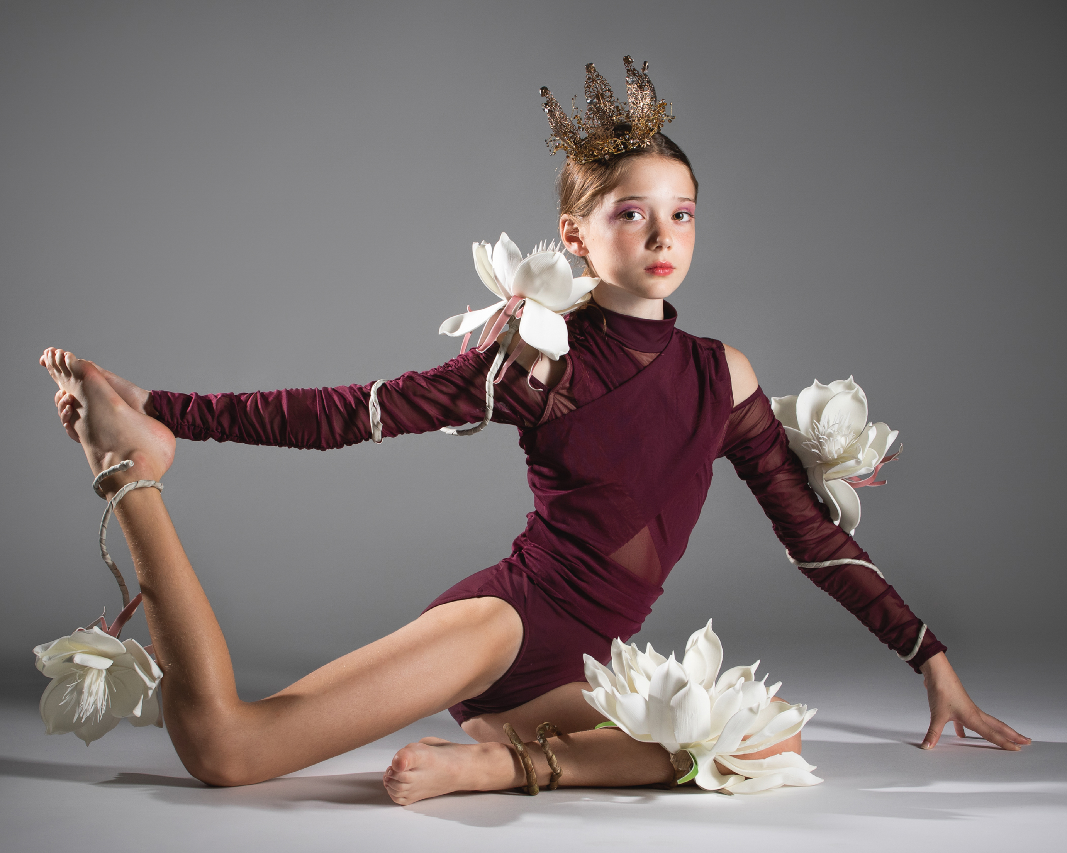 dancer wrapped in flower vine